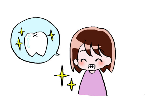 歯のホワイトニングを行いうれしく感じている女性