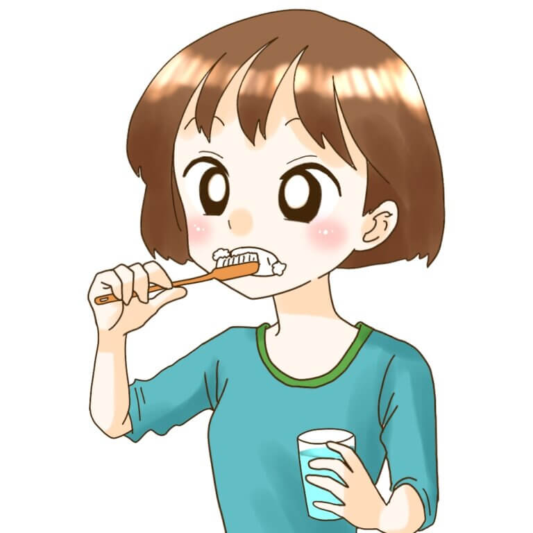 歯磨きをするママ