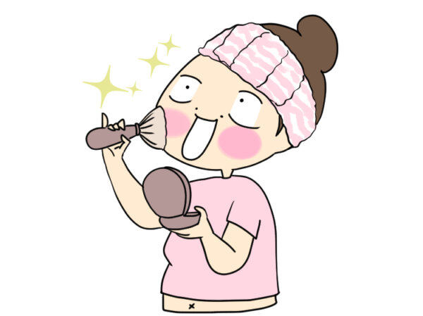 お化粧をする女性