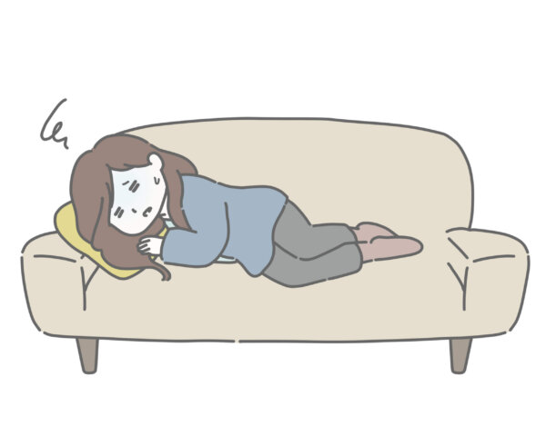 体調が悪くて横になる妊婦さん